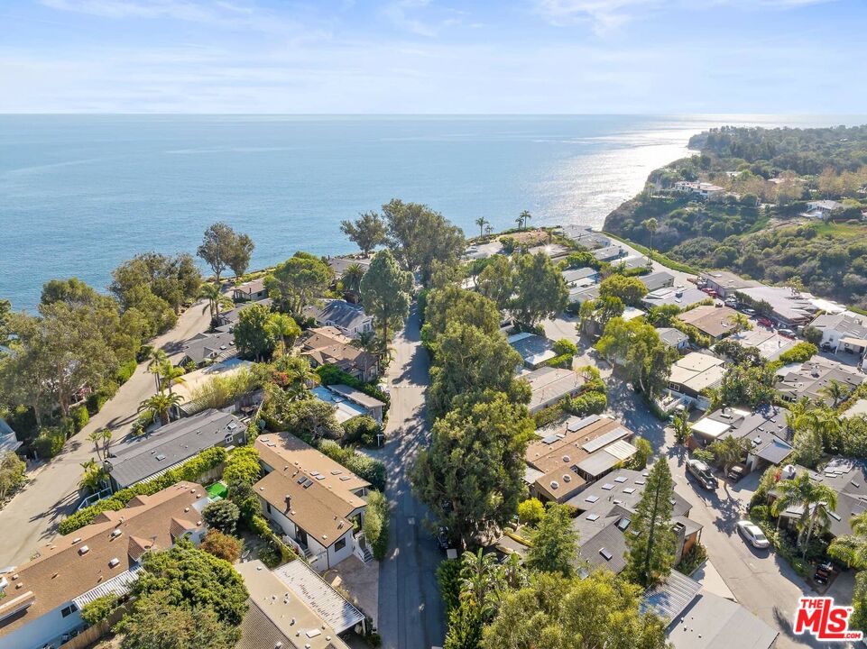 68 Paradise Cove Road Malibu, CA 90265 - Photo 17 of 28 an aerial view of a city with ocean view in back