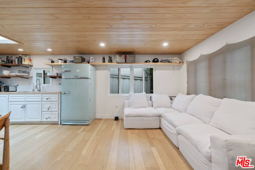 68 Paradise Cove Road Malibu, CA 90265 - Photo 2 of 28 a living room with furniture and a large window