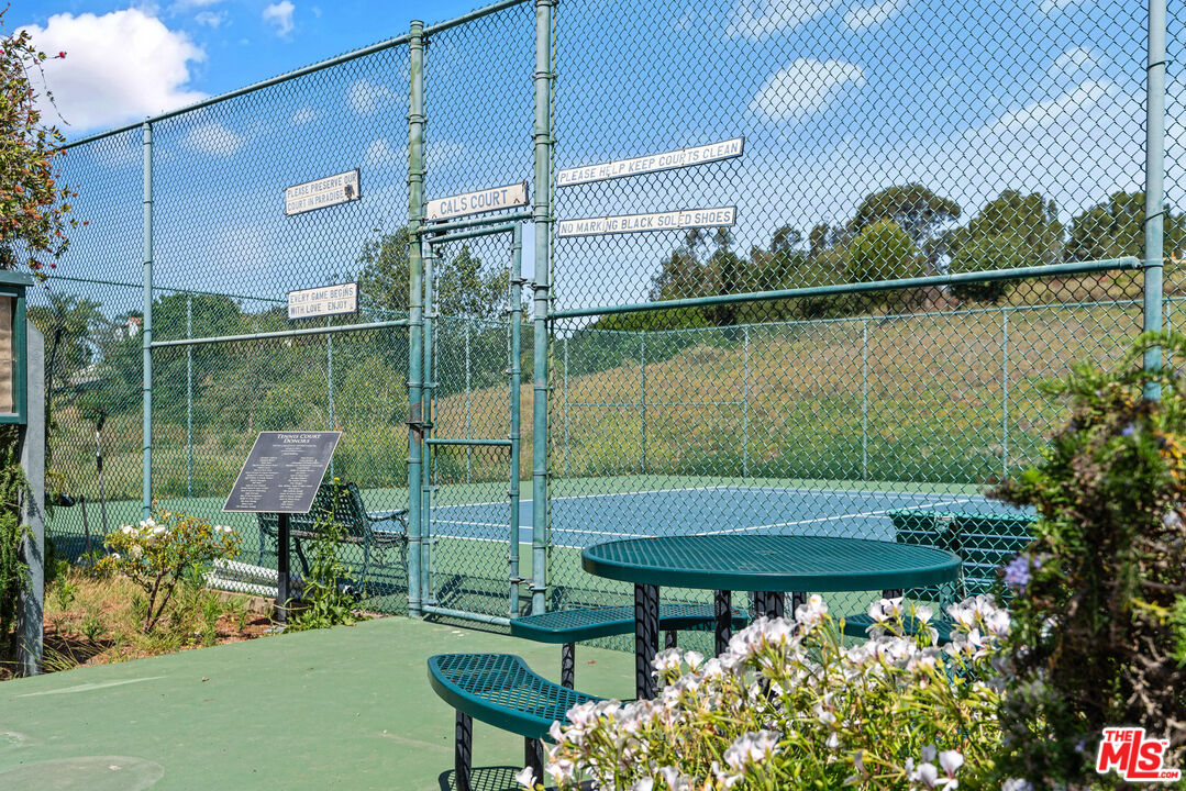 68 Paradise Cove Road Malibu, CA 90265 - Photo 23 of 28 a view of a chair and tables in the patio