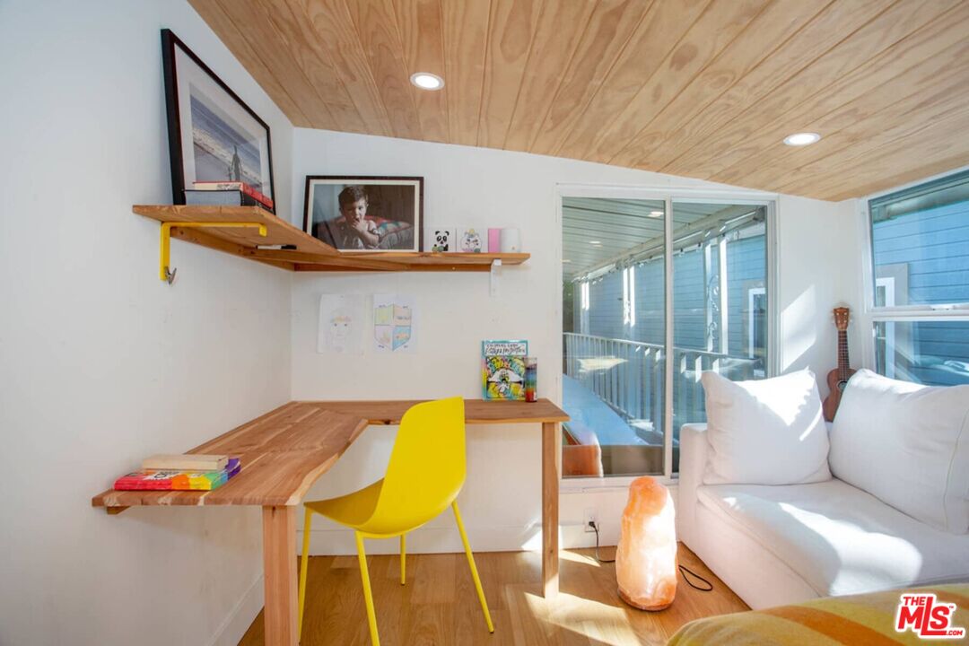 68 Paradise Cove Road Malibu, CA 90265 - Photo 5 of 28 a living room with furniture and a flat screen tv