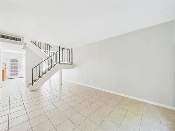 a view of entryway and hall with a window