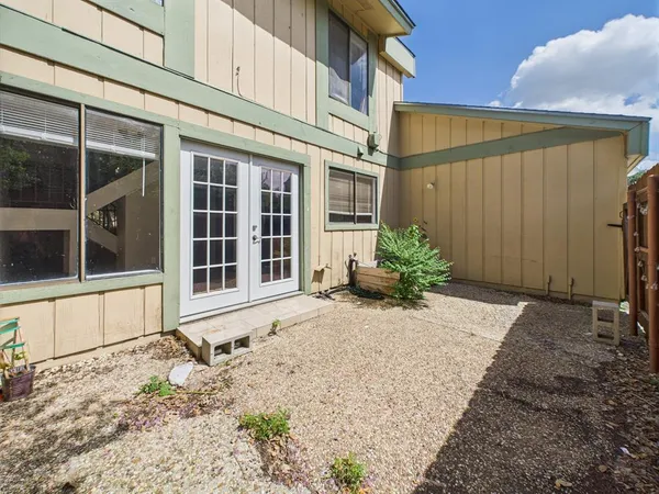 a view of a entryway door front of a house