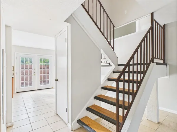 a view of an entryway with staircase