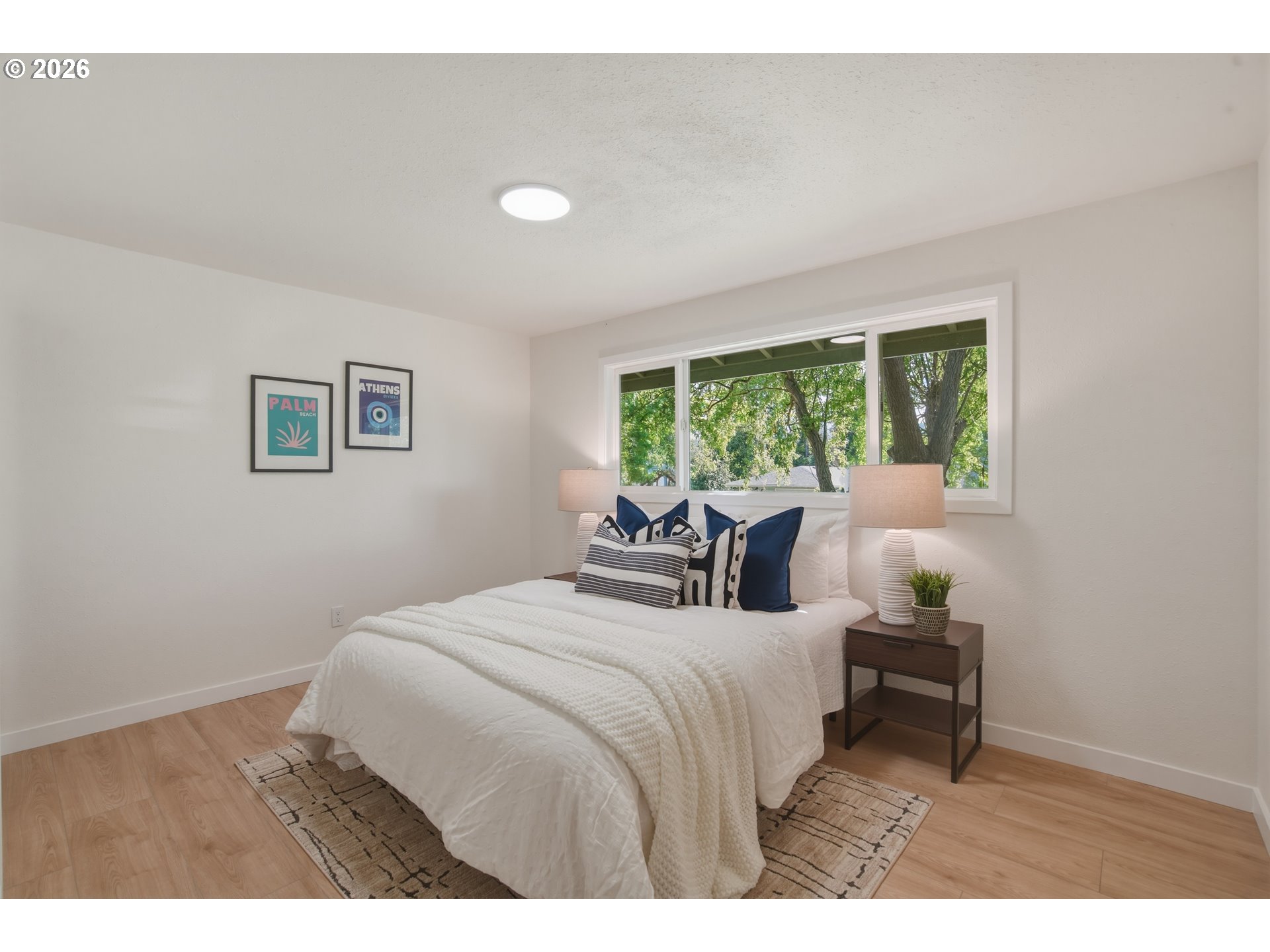 3455 Potter Street Eugene, OR 97405 - Photo 29 of 36 a bedroom with a bed and a large window
