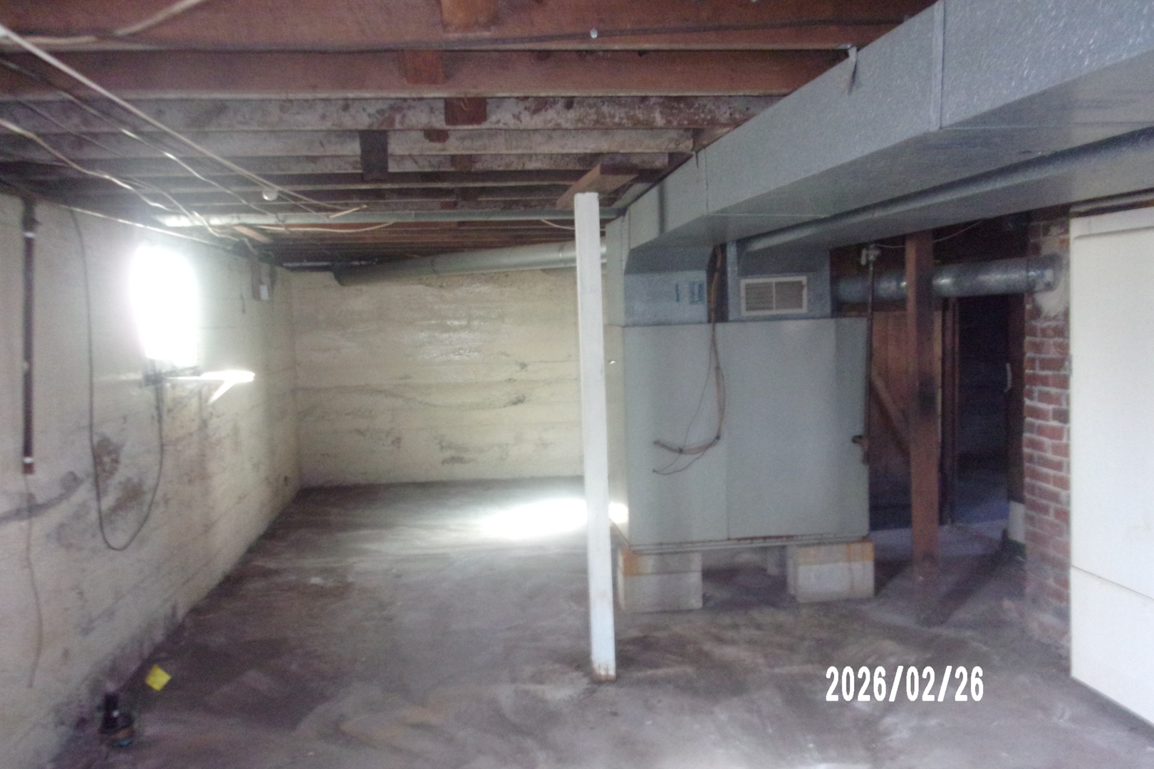202 North Harrison Street Flanagan, IL 61740 - Photo 14 of 16 a view of an empty room with a wooden door