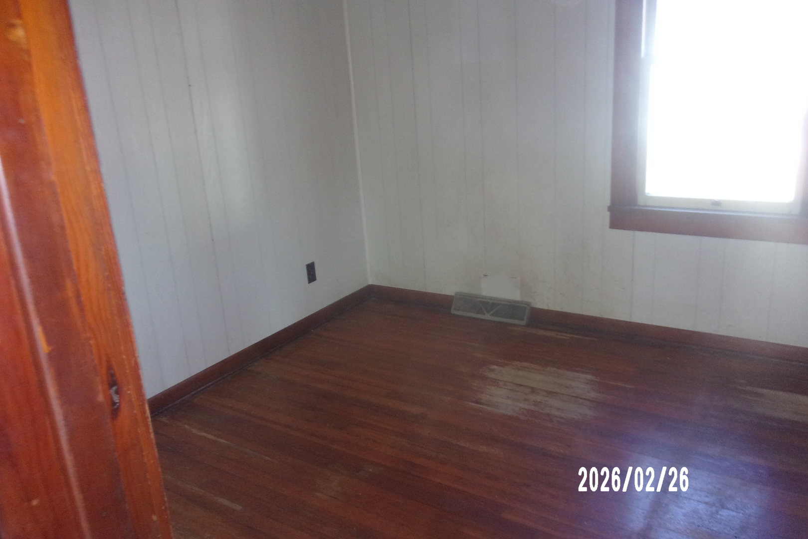 202 North Harrison Street Flanagan, IL 61740 - Photo 6 of 16 a view of empty room with window