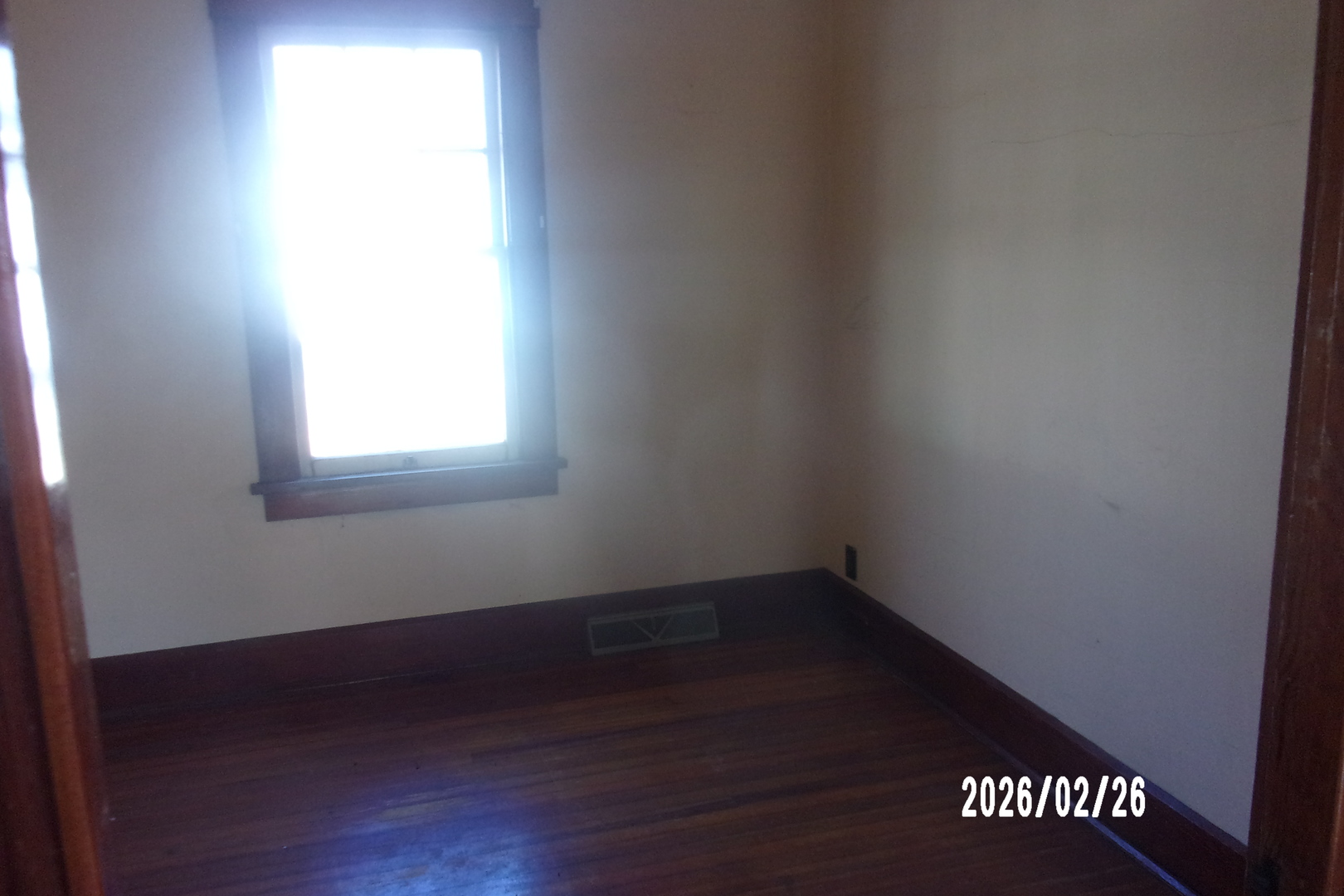 202 North Harrison Street Flanagan, IL 61740 - Photo 8 of 16 an empty room with a window
