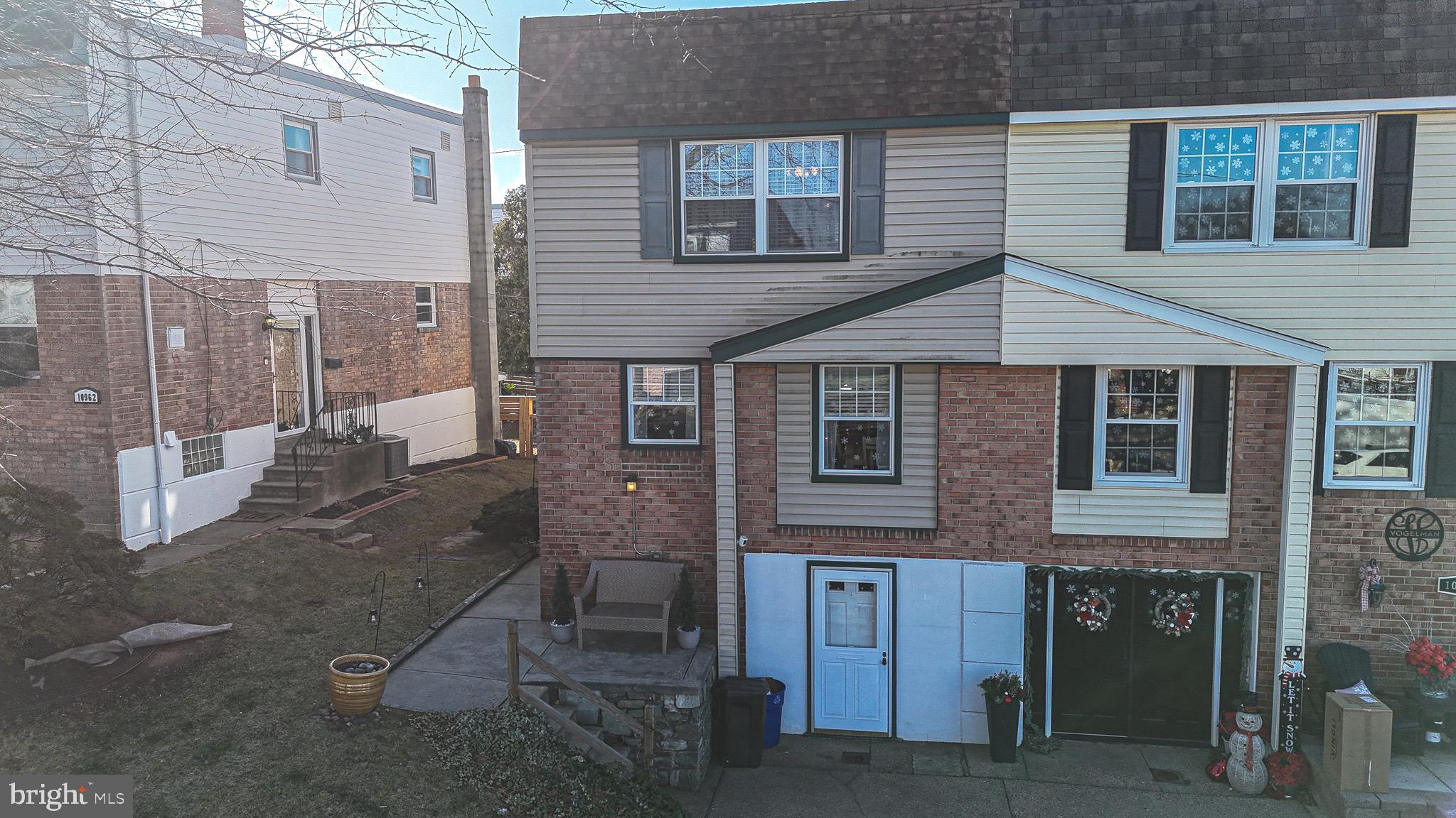 10964 Kipling Lane Philadelphia, PA 19154 - Photo 1 of 31 a view of a house with a yard and large tree