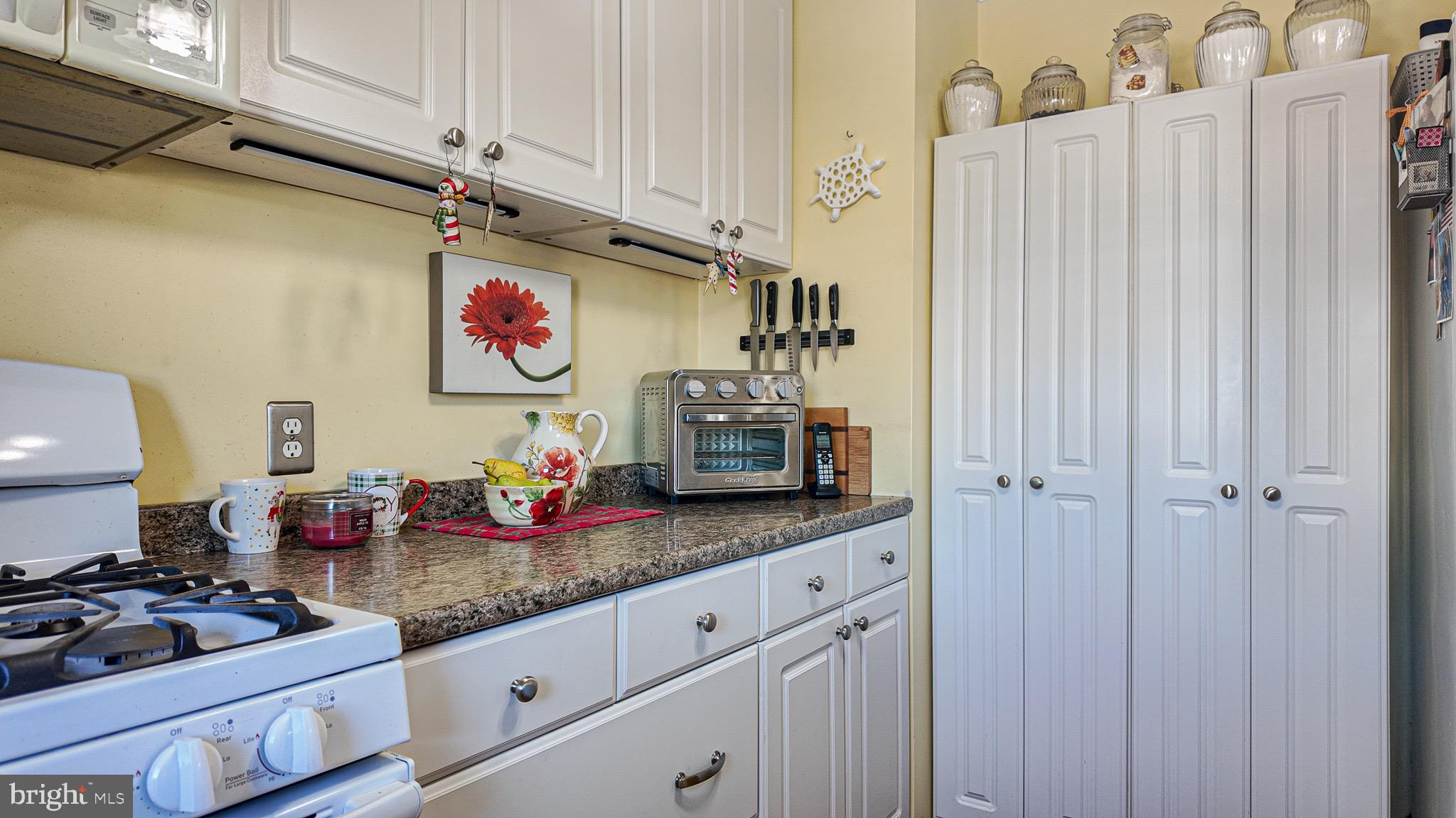 10964 Kipling Lane Philadelphia, PA 19154 - Photo 12 of 31 a kitchen with counter top space and stove top oven