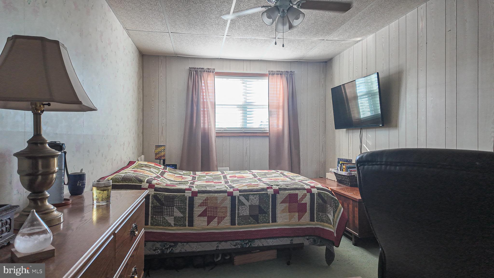 10964 Kipling Lane Philadelphia, PA 19154 - Photo 17 of 31 a bedroom with bed and window