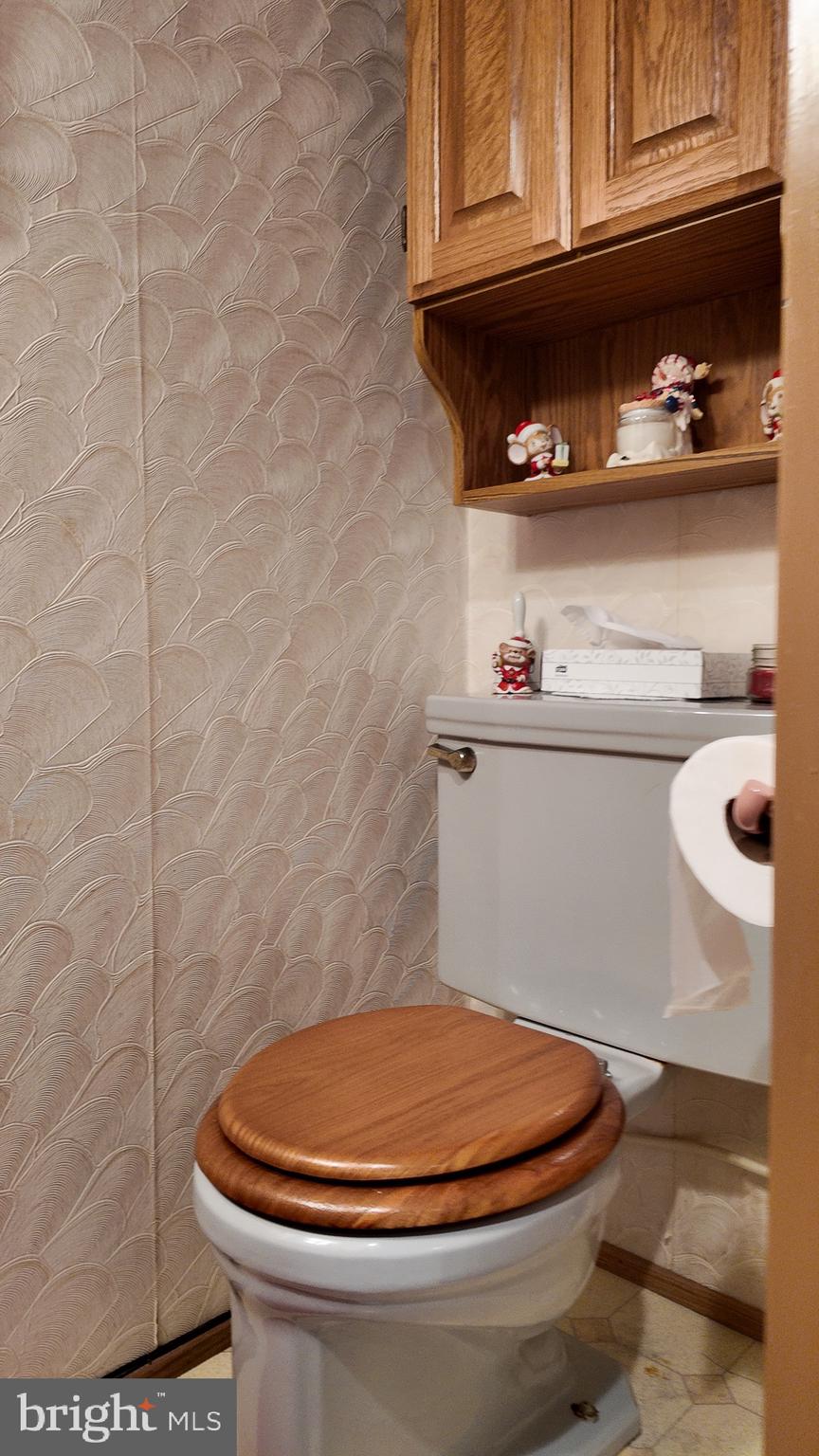10964 Kipling Lane Philadelphia, PA 19154 - Photo 27 of 31 a bathroom with a toilet and a sink