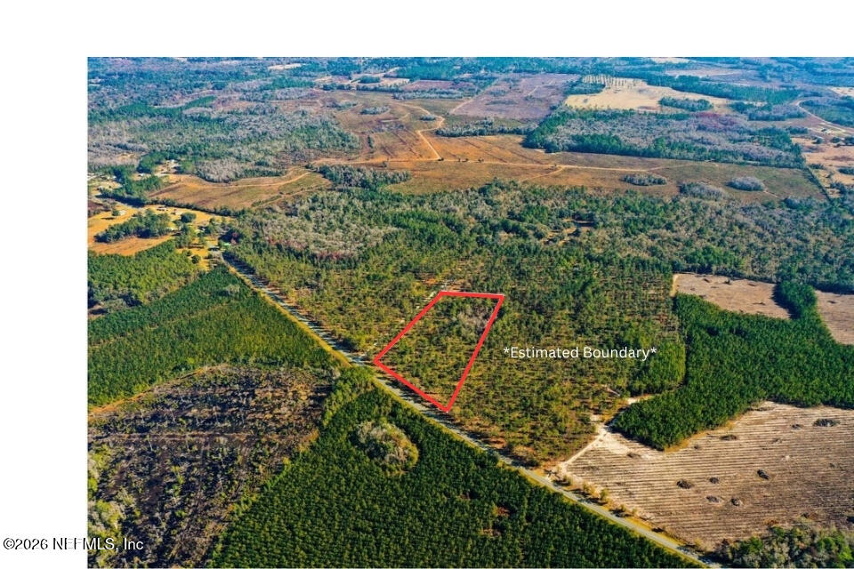 0 Northwest Falling Creek Road Lake City, FL 32055 - Photo 6 of 8 an aerial view of residential houses with outdoor space