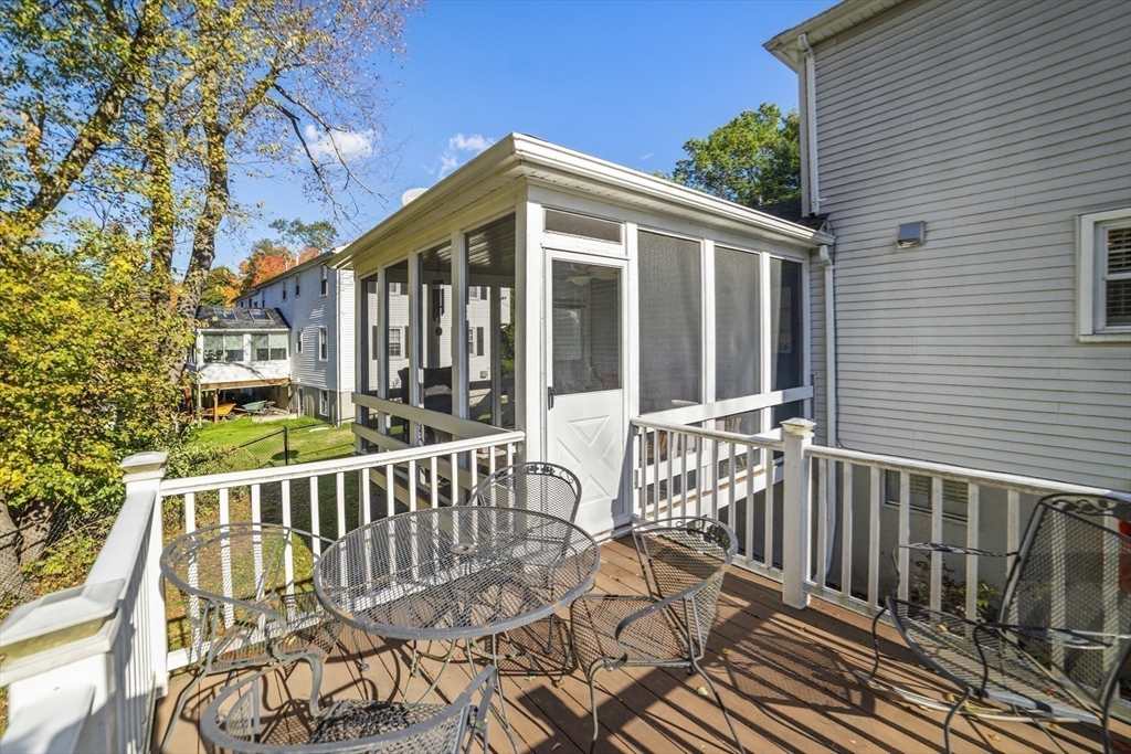1904 Washington Street Canton, MA 02021 - Photo 18 of 39 a view of a wooden deck and a yard