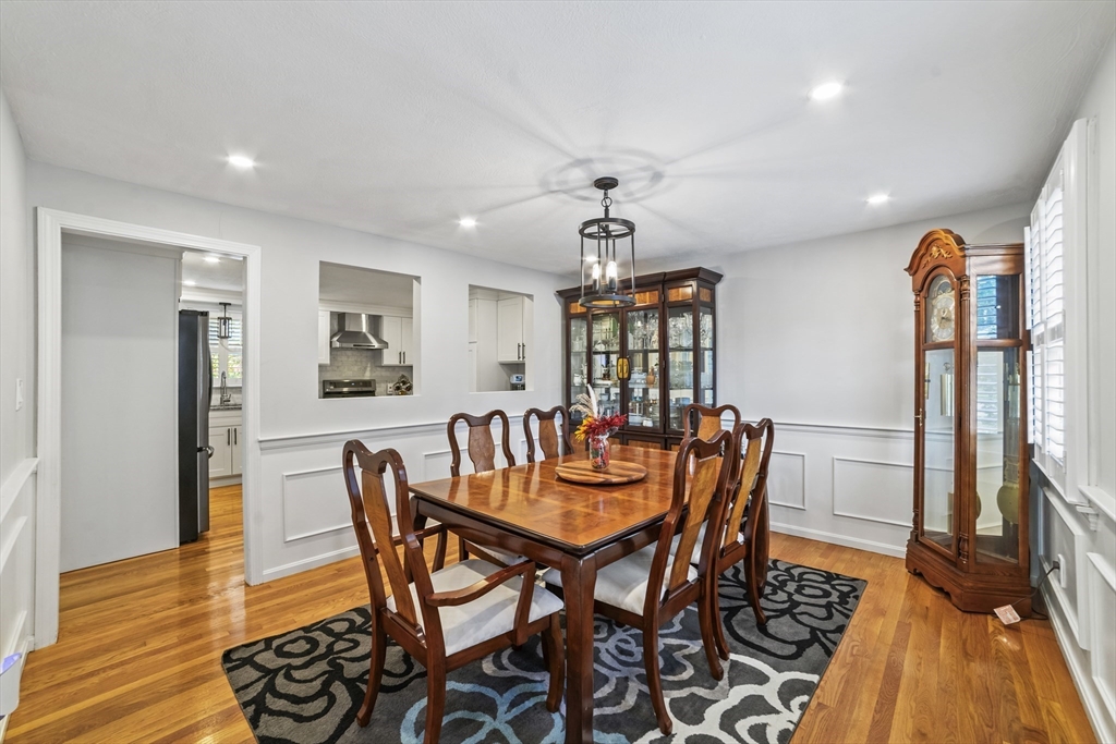 1904 Washington Street Canton, MA 02021 - Photo 7 of 39 a dining room with furniture and wooden floor
