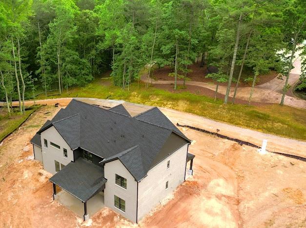 1560 Ewing Chapel Road Dacula, GA 30019 - Photo 13 of 15 a view of a backyard with swimming pool