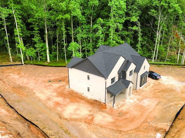 1560 Ewing Chapel Road Dacula, GA 30019 - Photo 14 of 15 a view of a house with a yard