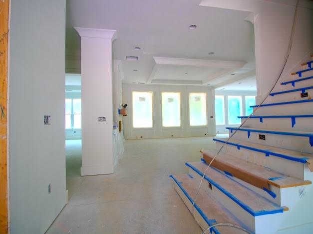 1560 Ewing Chapel Road Dacula, GA 30019 - Photo 3 of 15 a view of a room with lots of frames on wall and a window