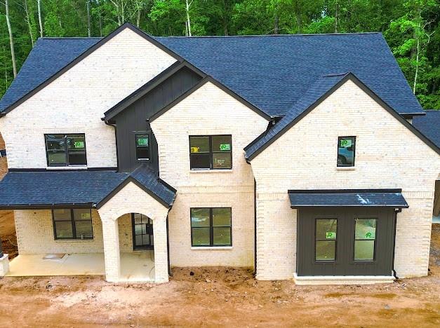 1560 Ewing Chapel Road Dacula, GA 30019 - Photo 7 of 15 a view of a house with a yard