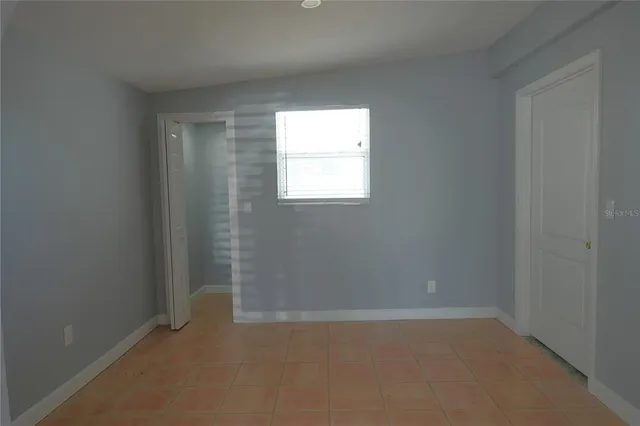 an empty room with a window
