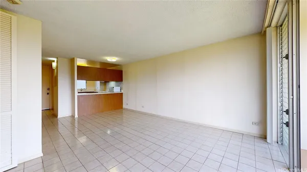 a view of kitchen view with cabinets