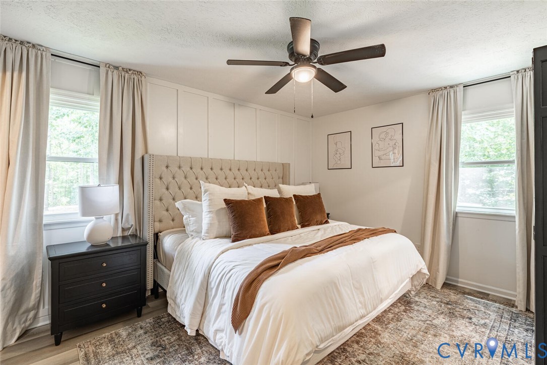 12397 New Market Mill Road Beaverdam, VA 23015 - Photo 15 of 44 a bedroom with a bed and a window