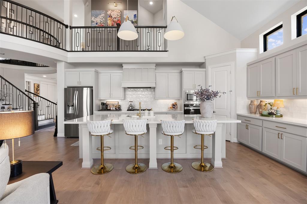 2413 Shane Drive Midlothian, TX 76065 - Photo 17 of 37 a kitchen with counter space appliances and cabinets