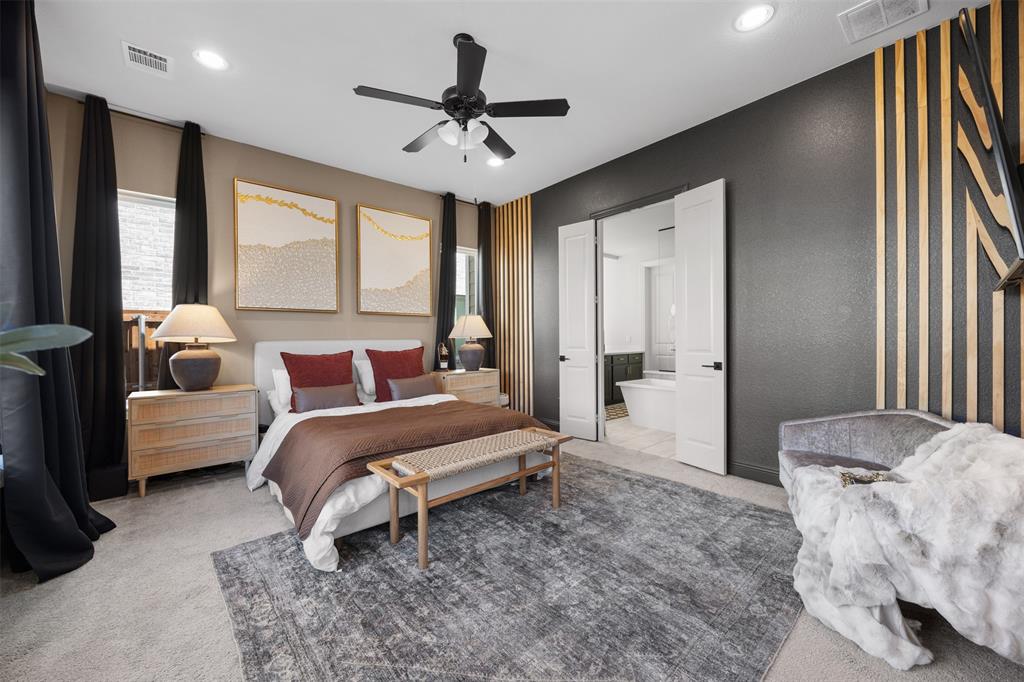 2413 Shane Drive Midlothian, TX 76065 - Photo 22 of 37 a bedroom with a bed and a chandelier