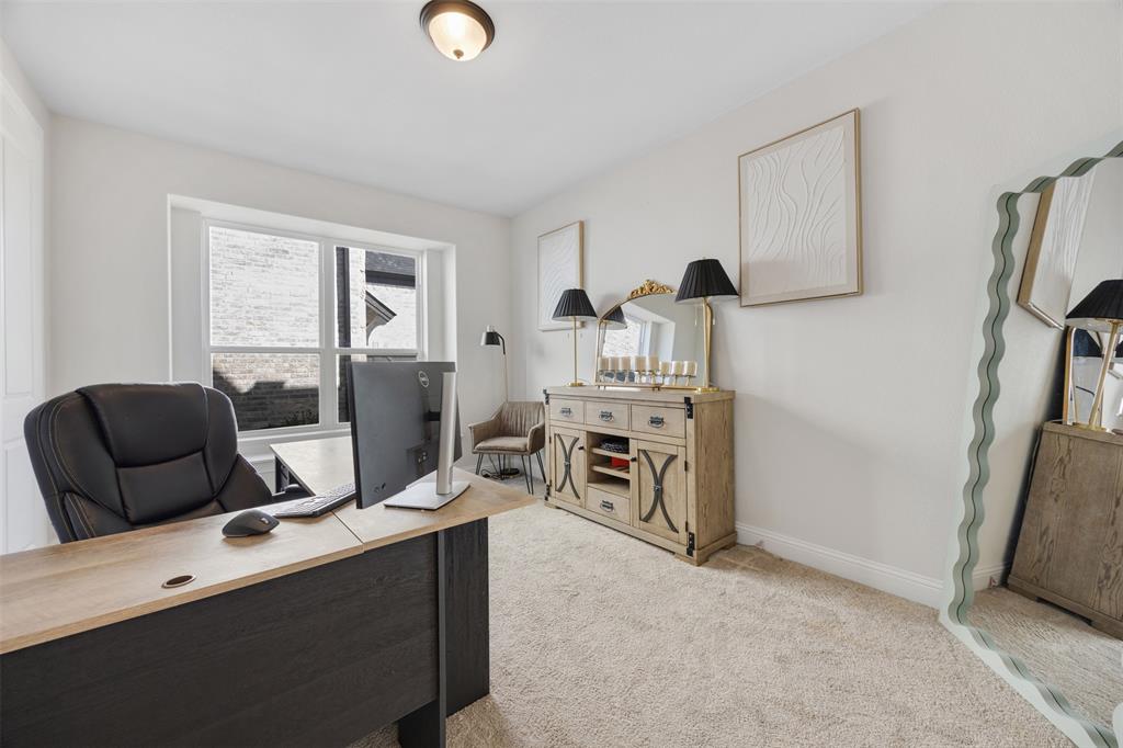 2413 Shane Drive Midlothian, TX 76065 - Photo 31 of 37 a view of a workspace with furniture and a window