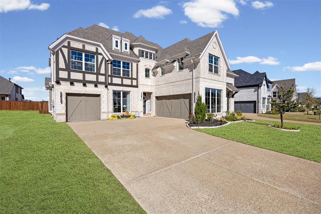 2413 Shane Drive Midlothian, TX 76065 - Photo 4 of 37 a front view of a house with a yard