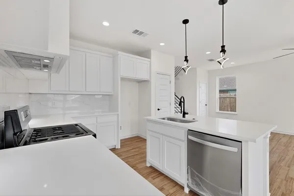a bathroom with a sink and mirror