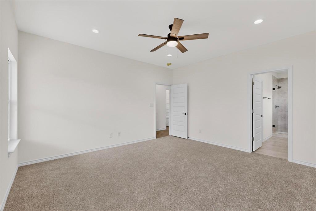 1610 Life Avenue Dallas, TX 75212 - Photo 21 of 38 a view of a room with a ceiling fan