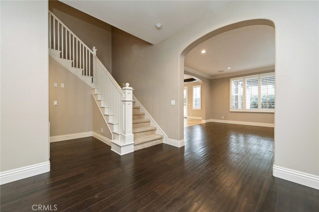 26 Secret Garden Irvine, CA 92620 - Photo 2 of 38 a view of an entryway with wooden floor