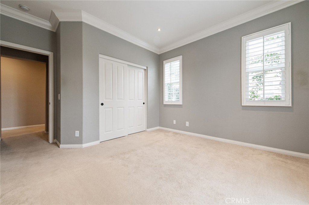26 Secret Garden Irvine, CA 92620 - Photo 24 of 38 a view of an empty room with window and closet area