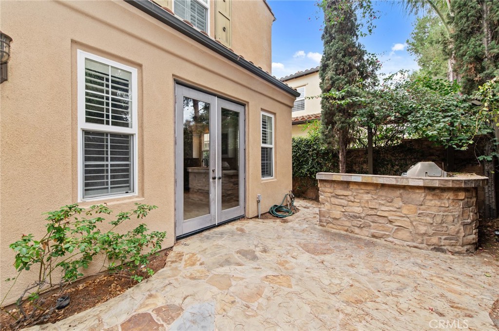 26 Secret Garden Irvine, CA 92620 - Photo 35 of 38 front view of a house with a yard