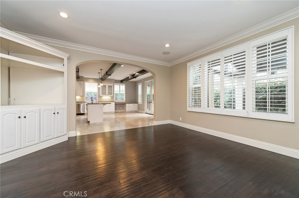26 Secret Garden Irvine, CA 92620 - Photo 5 of 38 a view of empty room with wooden floor and fan