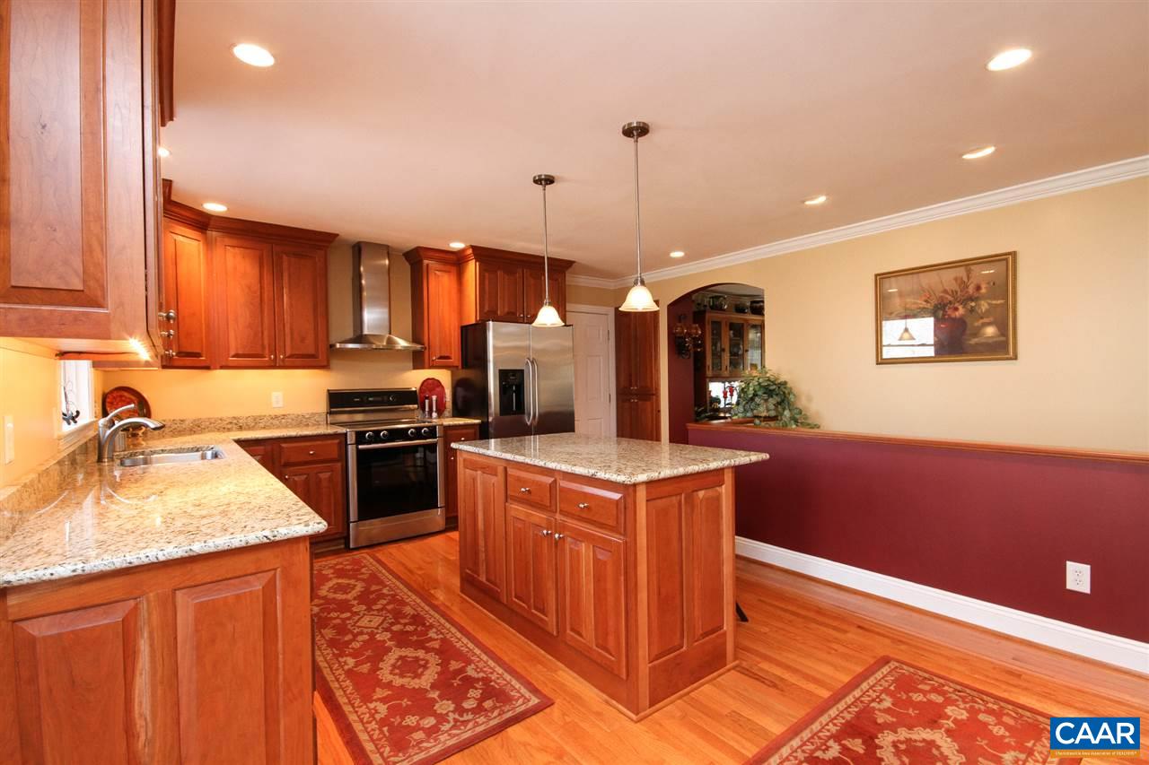 52 Oak Grove Road Palmyra, VA 22963 - Photo 6 of 46 a kitchen with stainless steel appliances granite countertop a sink stove and refrigerator