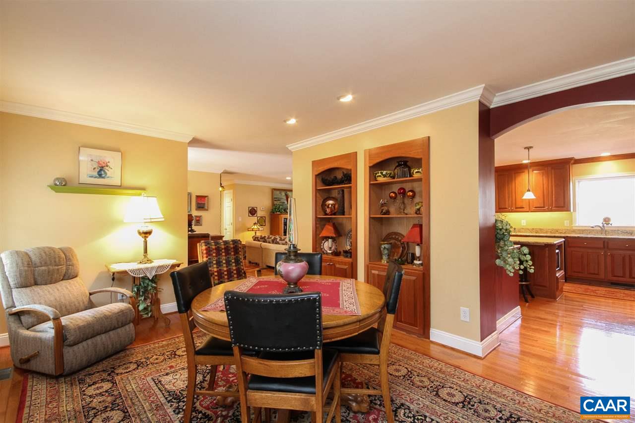 52 Oak Grove Road Palmyra, VA 22963 - Photo 7 of 46 a dining room with furniture and wooden floor