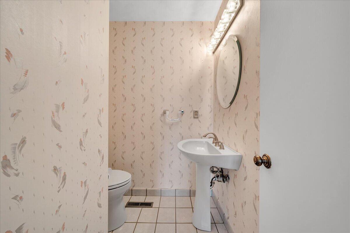 6878 Mt Chestnut Road Roanoke, VA 24018 - Photo 18 of 50 a bathroom with a sink toilet and shower