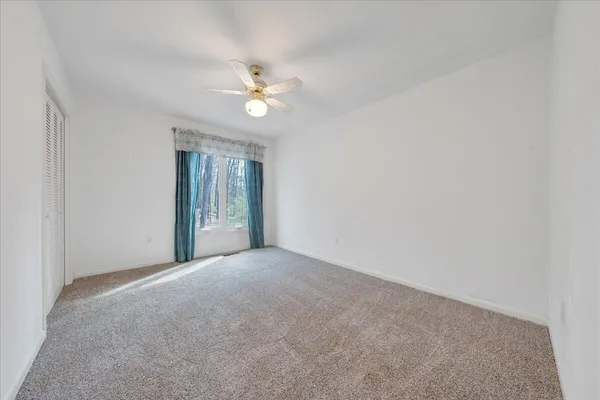 a bathroom with a sink mirror toilet and bathtub