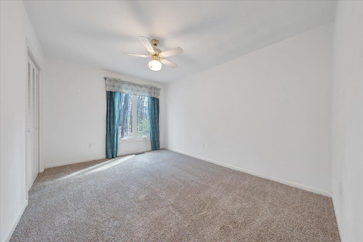 6878 Mt Chestnut Road Roanoke, VA 24018 - Photo 24 of 50 a view of an empty room with a window