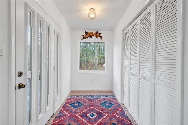 a view of a hallway with staircase