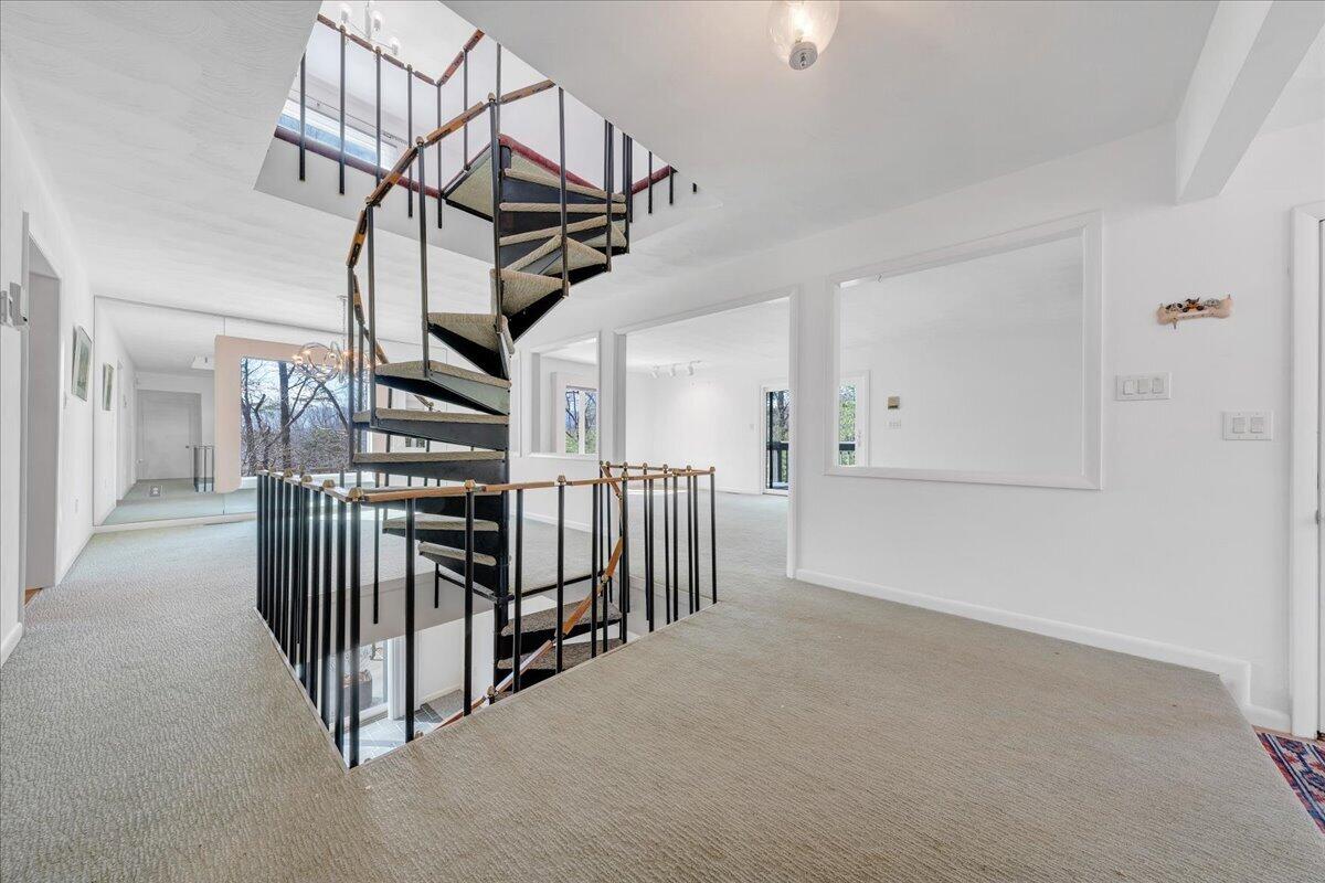 6878 Mt Chestnut Road Roanoke, VA 24018 - Photo 32 of 50 a view of a hallway with staircase