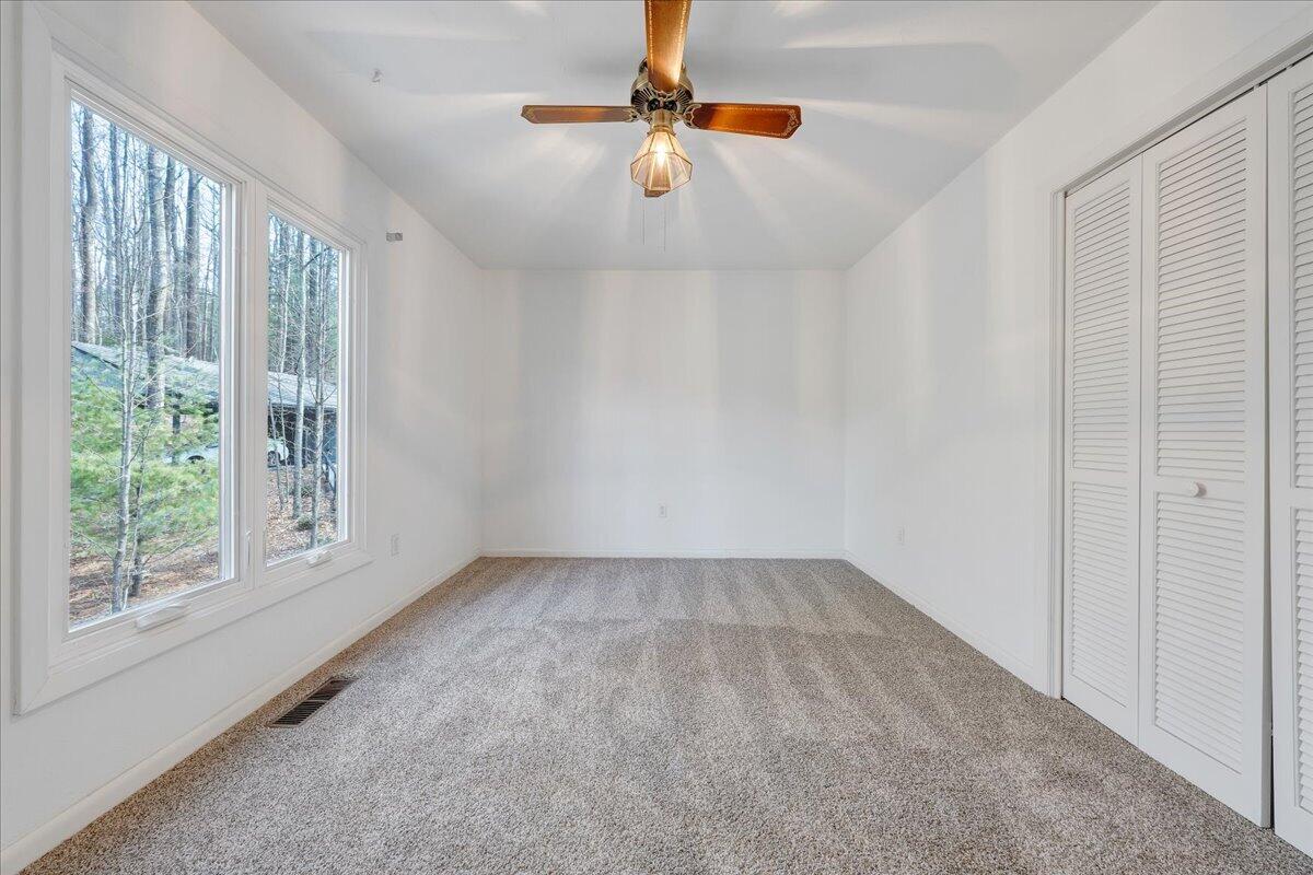 6878 Mt Chestnut Road Roanoke, VA 24018 - Photo 35 of 50 wooden floor in an empty room with a window