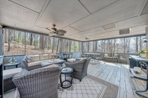 a outdoor dining space with furniture and outdoor view