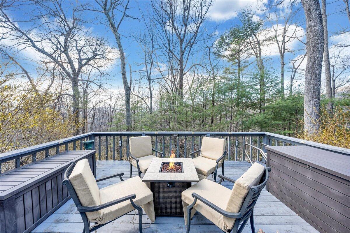 6878 Mt Chestnut Road Roanoke, VA 24018 - Photo 46 of 50 a balcony with wooden floor and outdoor seating