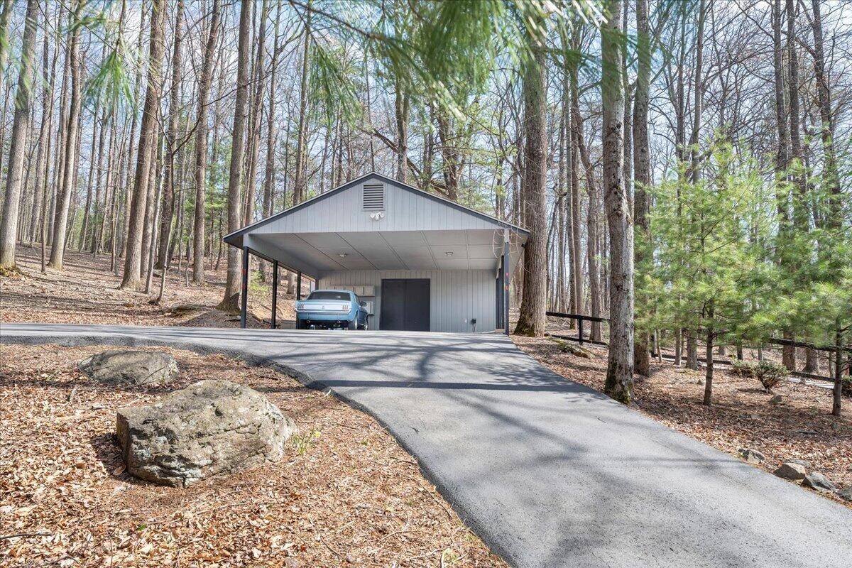 6878 Mt Chestnut Road Roanoke, VA 24018 - Photo 48 of 50 a view of a house with backyard and trees