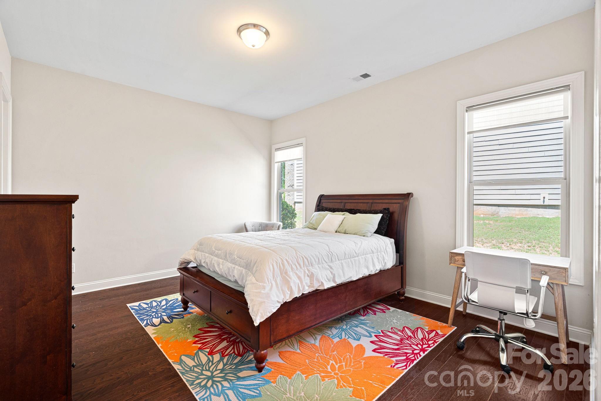 897 Tyne Drive Fort Mill, SC 29715 - Photo 12 of 46 a bedroom with a bed rug and a window