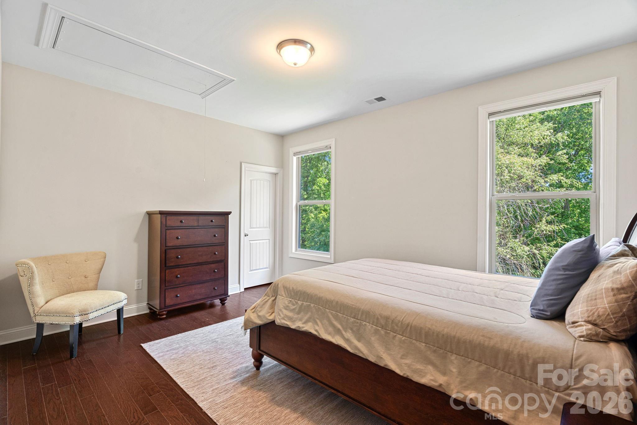 897 Tyne Drive Fort Mill, SC 29715 - Photo 15 of 46 a bedroom with a bed and chair