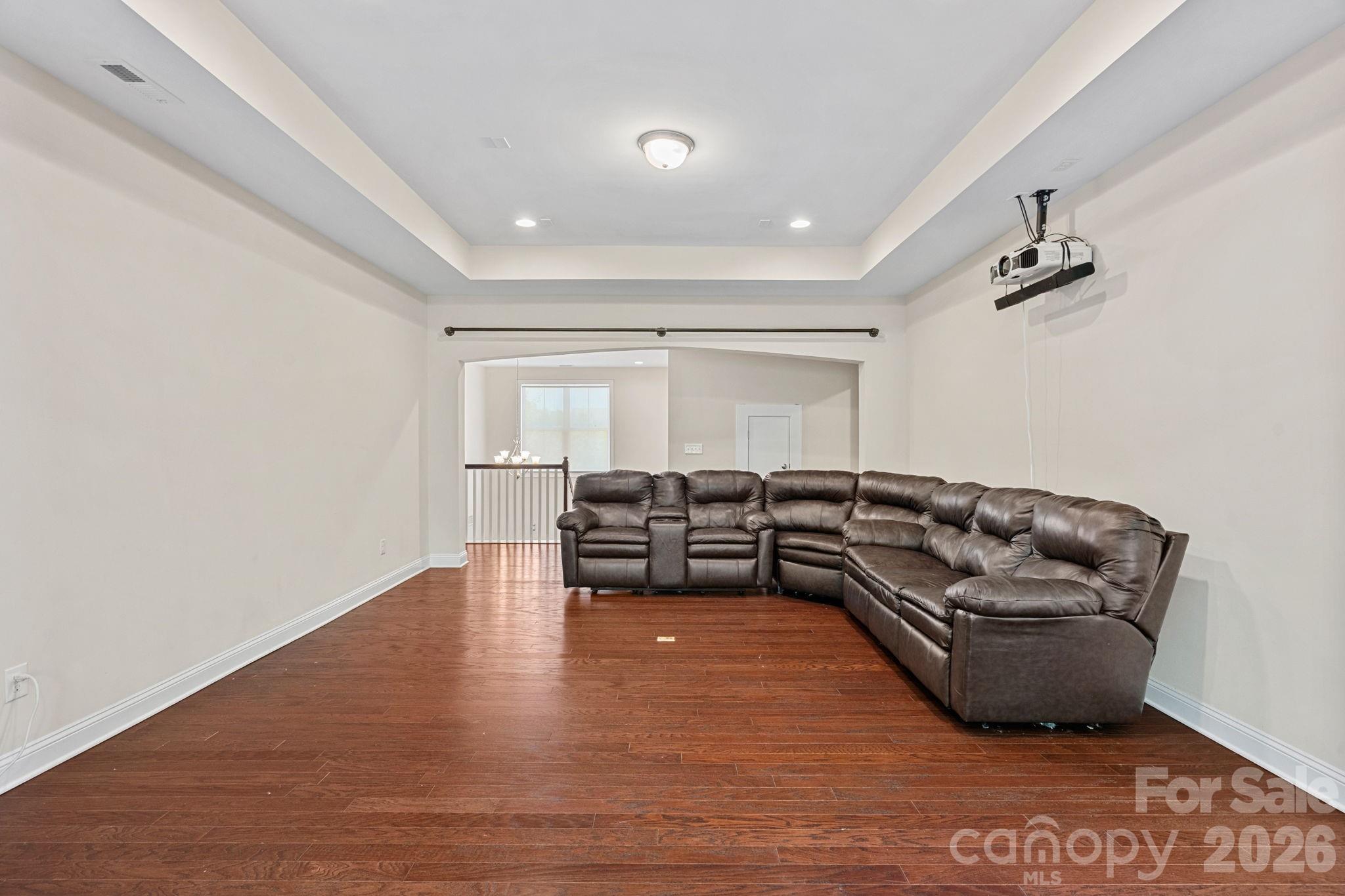 897 Tyne Drive Fort Mill, SC 29715 - Photo 20 of 46 a living room with furniture and a wooden floor