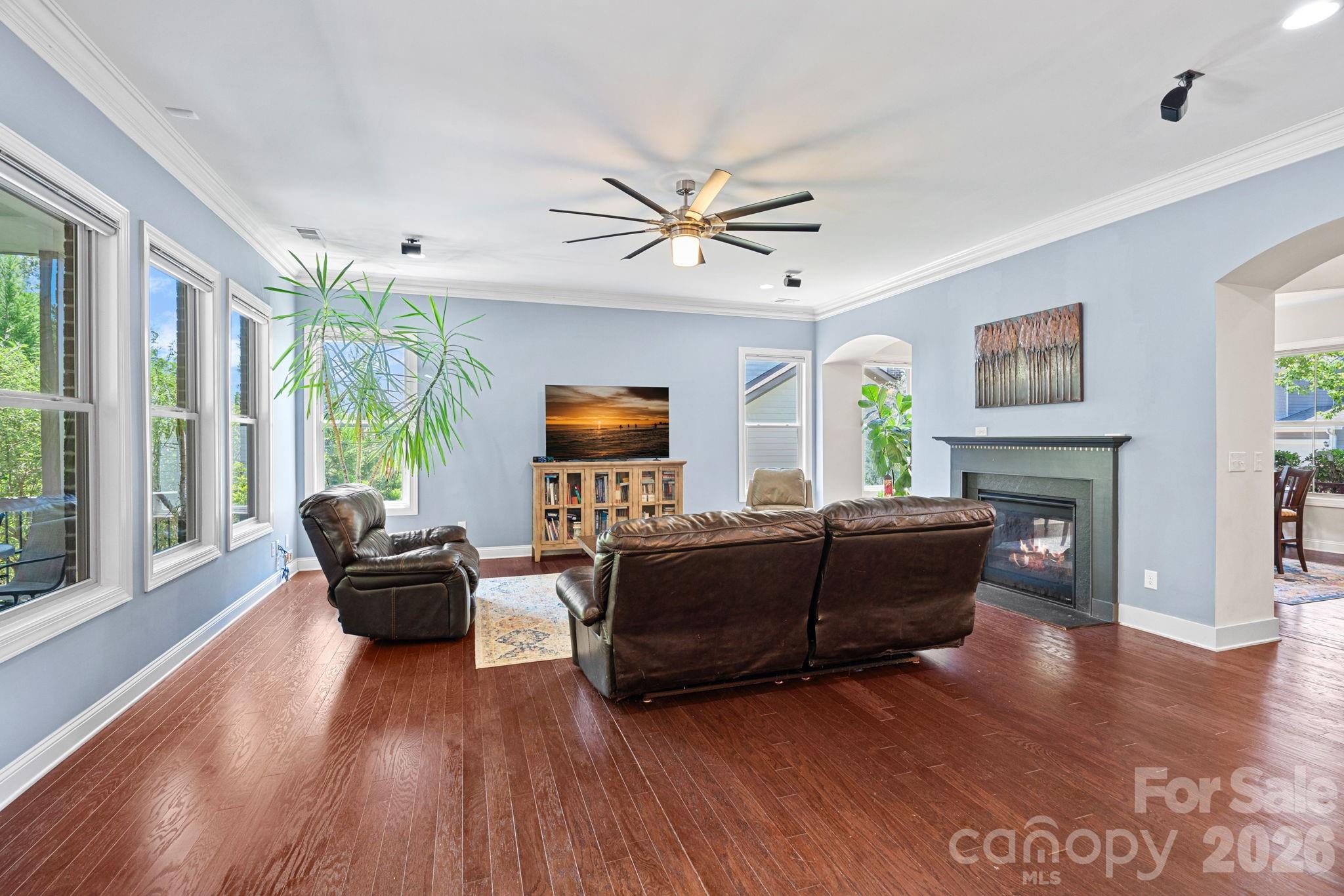 897 Tyne Drive Fort Mill, SC 29715 - Photo 37 of 46 a living room with furniture fireplace and a large window